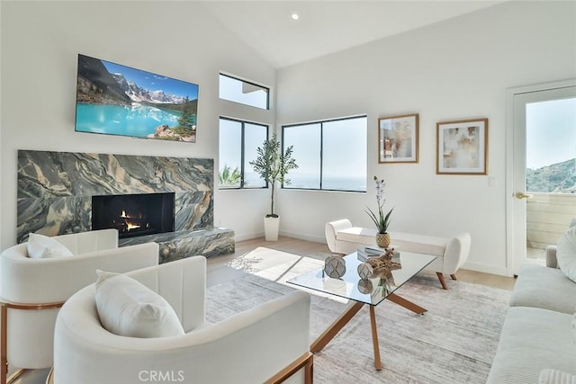 1369 Paseo Redondo, Burbank, CA 91501 - living room featuring wood finished floors, high vaulted ceiling, and a premium fireplace