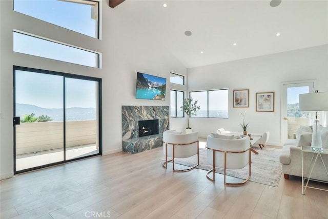 1369 Paseo Redondo, Burbank, CA 91501 - living area featuring high vaulted ceiling, wood finished floors, a fireplace, and recessed lighting