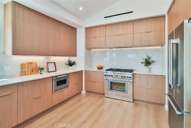 1369 Paseo Redondo, Burbank, CA 91501 - kitchen with premium appliances, modern cabinets, light brown cabinets, light wood finished floors, and lofted ceiling