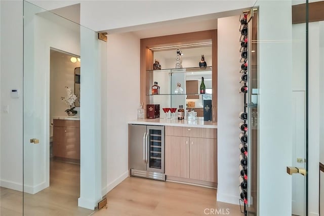 1369 Paseo Redondo, Burbank, CA 91501 - indoor wet bar featuring beverage cooler and light wood finished floors