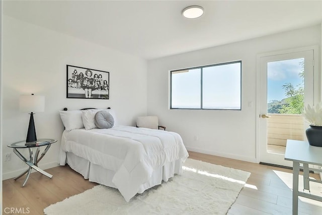 1369 Paseo Redondo, Burbank, CA 91501 - bedroom featuring light wood-style flooring and access to outside