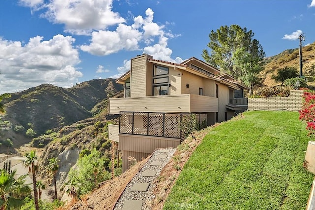 1369 Paseo Redondo, Burbank, CA 91501 - view of home's exterior with a mountain view and a lawn
