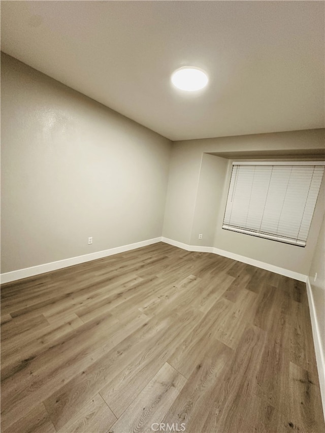 1350 William Mcgrath St, Colton, CA 92324 - empty room featuring wood finished floors