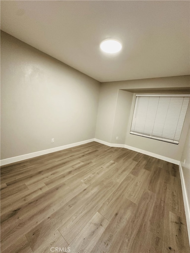 1350 William Mcgrath St, Colton, CA 92324 - unfurnished room featuring wood finished floors