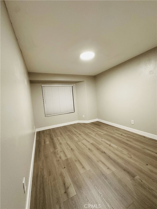 1350 William Mcgrath St, Colton, CA 92324 - unfurnished room with wood finished floors and baseboards