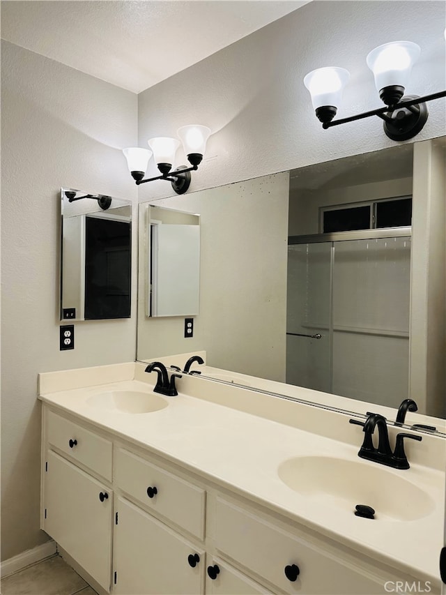 1350 William Mcgrath St, Colton, CA 92324 - full bath featuring double vanity and an enclosed shower