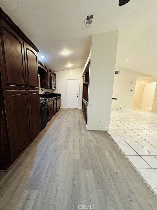 1350 William Mcgrath St, Colton, CA 92324 - kitchen with black dishwasher, dark brown cabinetry, stainless steel microwave, and light wood-type flooring