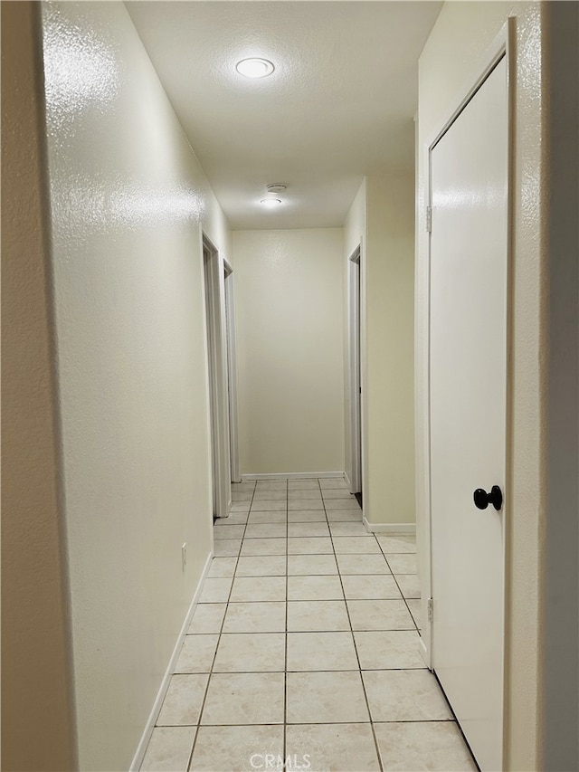 1350 William Mcgrath St, Colton, CA 92324 - hall featuring light tile patterned floors and recessed lighting
