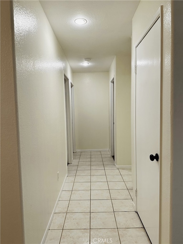1350 William Mcgrath St, Colton, CA 92324 - hall featuring light tile patterned floors and recessed lighting