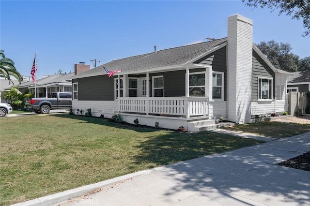200 N Alberta Pl, Fullerton, CA 92833 - ranch-style home with a porch, a chimney, and a front lawn