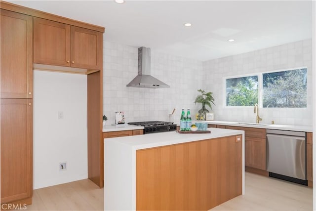200 N Alberta Pl, Fullerton, CA 92833 - kitchen featuring stainless steel dishwasher, wall chimney range hood, light countertops, tasteful backsplash, and recessed lighting