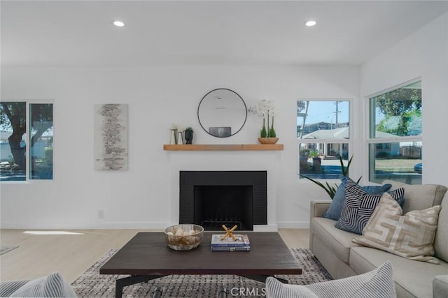 200 N Alberta Pl, Fullerton, CA 92833 - living room with recessed lighting, wood finished floors, and a fireplace
