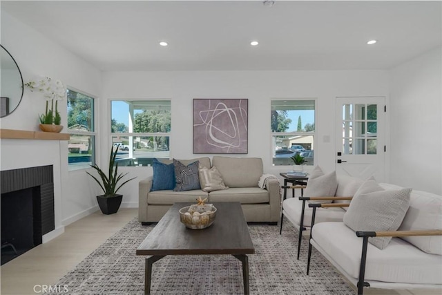 200 N Alberta Pl, Fullerton, CA 92833 - living room with healthy amount of natural light, wood finished floors, recessed lighting, and a fireplace