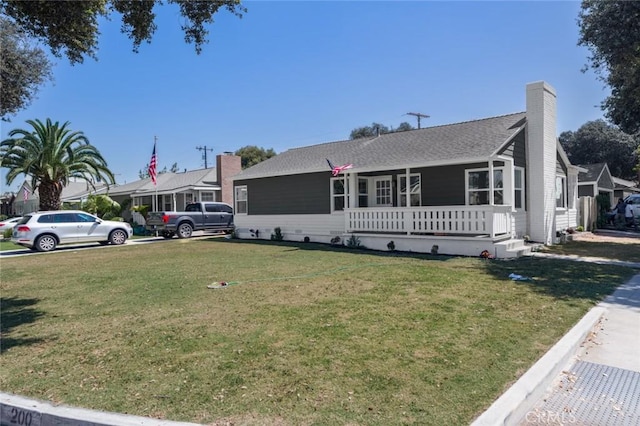 200 N Alberta Pl, Fullerton, CA 92833 - single story home featuring a porch, a front lawn, a chimney, and roof with shingles