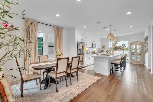 516 Caleigh Ln, Costa Mesa, CA 92627 - dining room with wood finished floors and recessed lighting