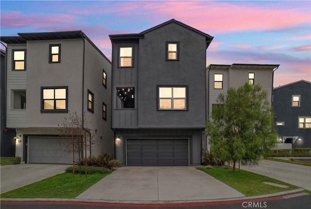 516 Caleigh Ln, Costa Mesa, CA 92627 - view of front facade featuring stucco siding and an attached garage