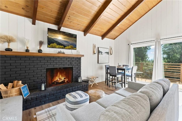 698 W Victoria Ct, Lake Arrowhead, CA 92352 - living room with wood ceiling, wood finished floors, and a fireplace