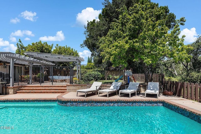18845 Braemore Rd, Porter Ranch, CA 91326 - view of pool with a pergola, a patio, and a fenced backyard