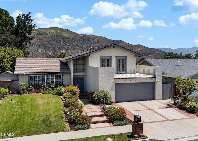 18845 Braemore Rd, Porter Ranch, CA 91326 - view of front of house featuring stucco siding, french doors, and a mountain view