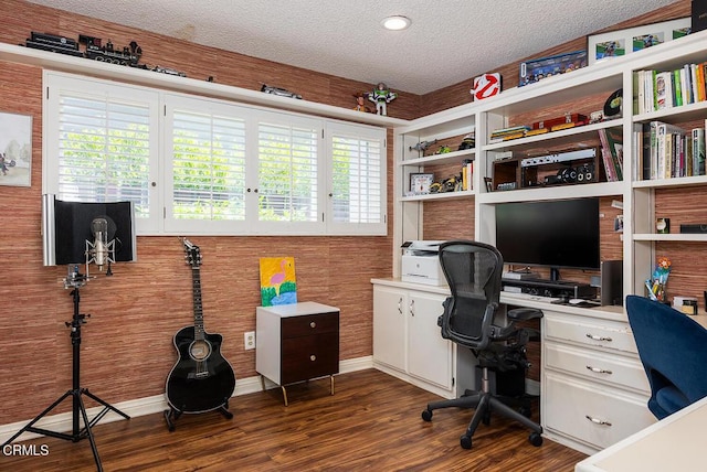 18845 Braemore Rd, Porter Ranch, CA 91326 - office space with dark wood-style floors, built in desk, and a textured ceiling