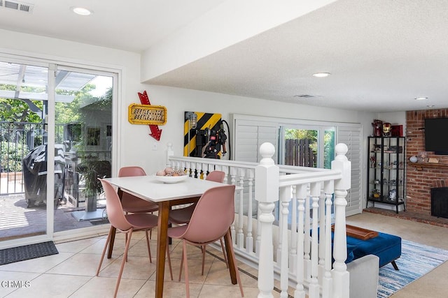 18845 Braemore Rd, Porter Ranch, CA 91326 - dining room with healthy amount of natural light, recessed lighting, and a fireplace