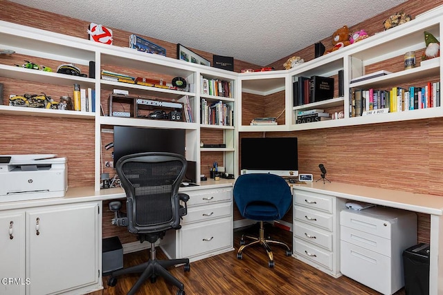 18845 Braemore Rd, Porter Ranch, CA 91326 - office with built in study area, dark wood-style flooring, and a textured ceiling