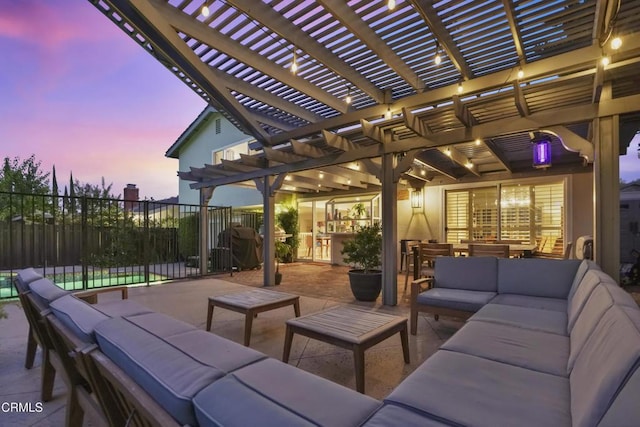 18845 Braemore Rd, Porter Ranch, CA 91326 - patio terrace at dusk with outdoor lounge area, a pergola, and a patio area