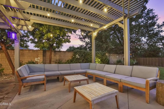 18845 Braemore Rd, Porter Ranch, CA 91326 - patio terrace at dusk featuring an outdoor hangout area, a fenced backyard, a pergola, and a patio area