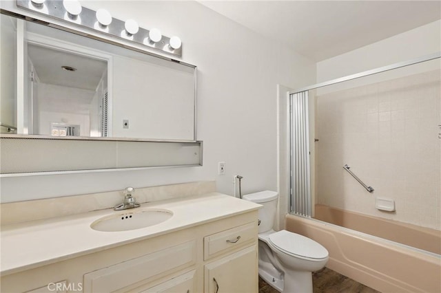 2179 Via Puerta Unit R, Laguna Woods, CA 92637 - full bathroom with vanity, shower / washtub combination, and wood finished floors