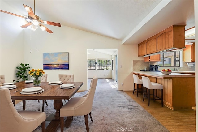 35632 Avocado St, Yucaipa, CA 92399 - dining room featuring lofted ceiling, light wood finished floors, and a ceiling fan