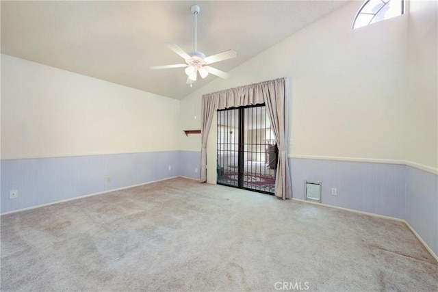 35632 Avocado St, Yucaipa, CA 92399 - unfurnished room with carpet flooring, ceiling fan, high vaulted ceiling, and wainscoting