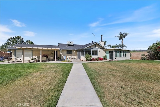 35632 Avocado St, Yucaipa, CA 92399 - view of front of house with a garage, a sunroom, and a patio area