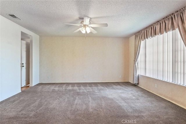 35632 Avocado St, Yucaipa, CA 92399 - carpeted spare room with a ceiling fan and a textured ceiling