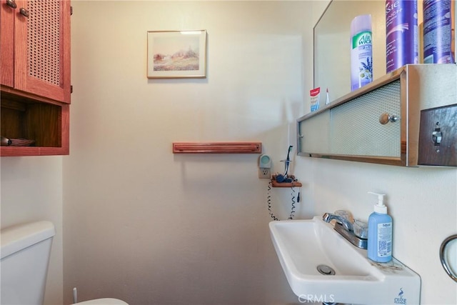 35632 Avocado St, Yucaipa, CA 92399 - half bath with a sink and toilet