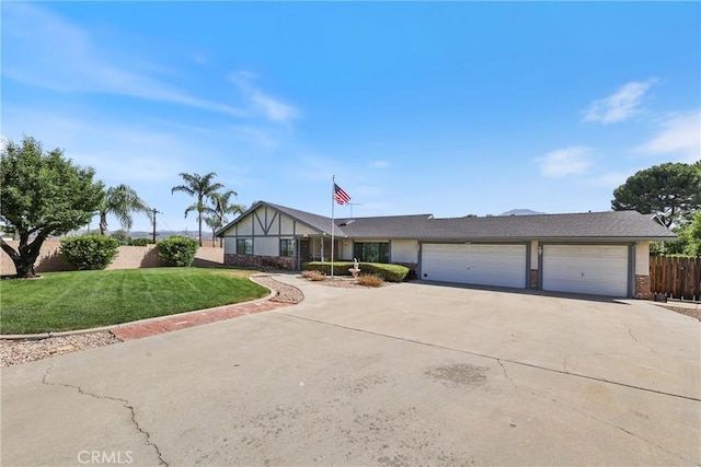 35632 Avocado St, Yucaipa, CA 92399 - view of front of home featuring driveway and an attached garage