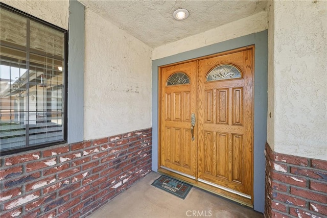 35632 Avocado St, Yucaipa, CA 92399 - entrance to property with stucco siding, brick siding, and covered porch