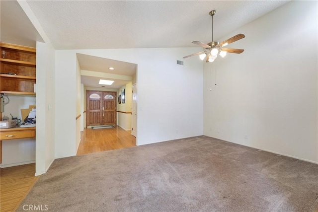 35632 Avocado St, Yucaipa, CA 92399 - unfurnished room featuring carpet floors, a ceiling fan, and vaulted ceiling