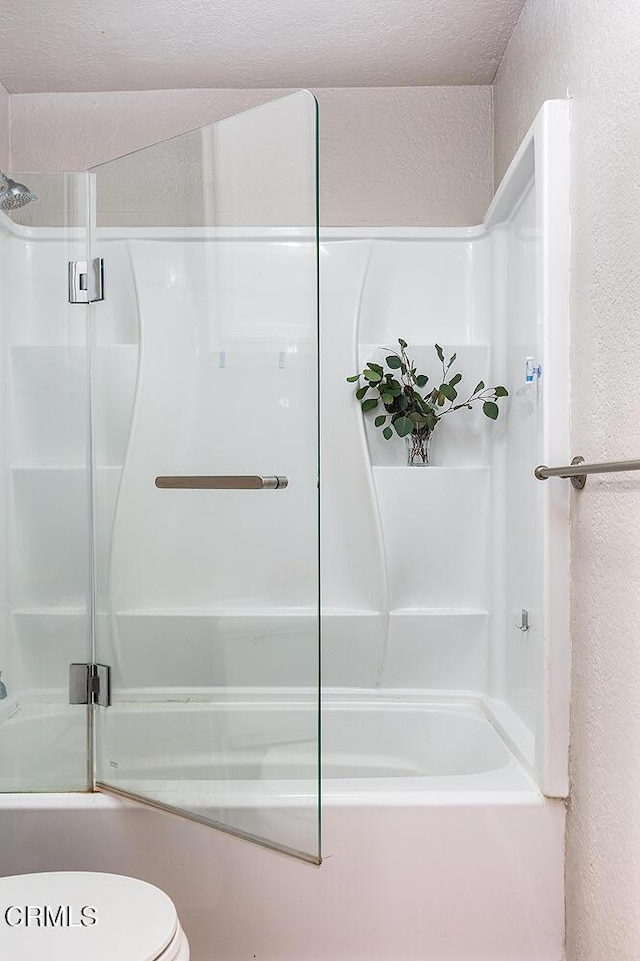 377 W California Ave, Glendale, CA 91203 - full bathroom featuring a textured wall and shower / bath combination with glass door
