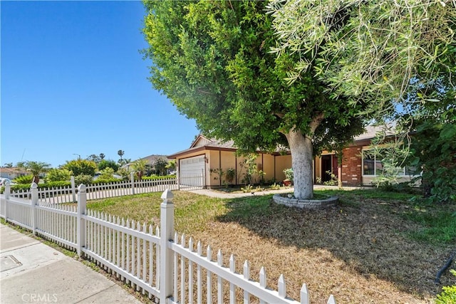 1626 Birchfield Dr, Tustin, CA 92780 - view of property hidden behind natural elements with concrete driveway