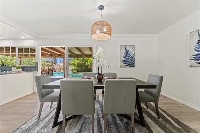 1626 Birchfield Dr, Tustin, CA 92780 - dining area featuring wood finished floors and ornamental molding