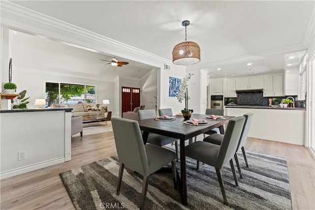 1626 Birchfield Dr, Tustin, CA 92780 - dining area featuring ornamental molding, light wood finished floors, a ceiling fan, and recessed lighting