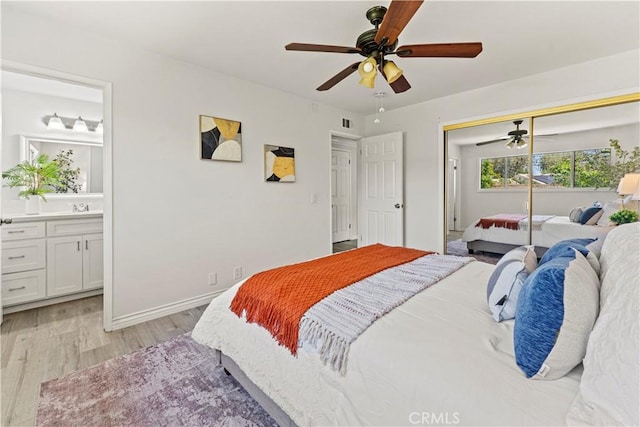 1626 Birchfield Dr, Tustin, CA 92780 - bedroom featuring light wood finished floors, a closet, connected bathroom, and ceiling fan