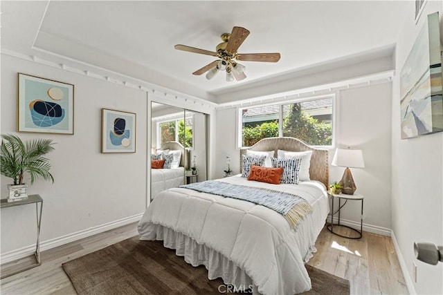 1626 Birchfield Dr, Tustin, CA 92780 - bedroom with wood finished floors, a closet, and ceiling fan