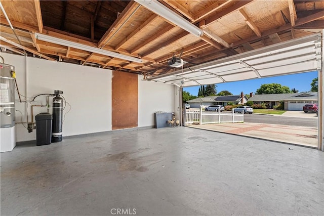 1626 Birchfield Dr, Tustin, CA 92780 - garage with a garage door opener and water heater