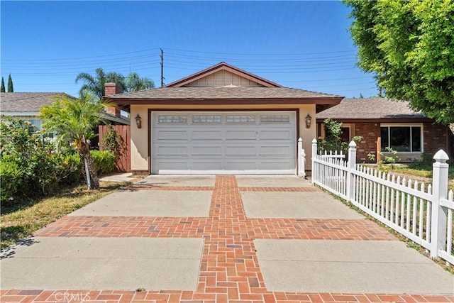 1626 Birchfield Dr, Tustin, CA 92780 - ranch-style home featuring stucco siding, driveway, and a shingled roof