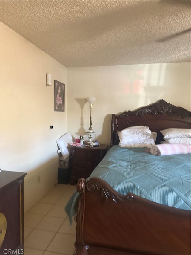 18605 New Hampshire St, Adelanto, CA 92301 - bedroom with a textured ceiling and tile patterned floors