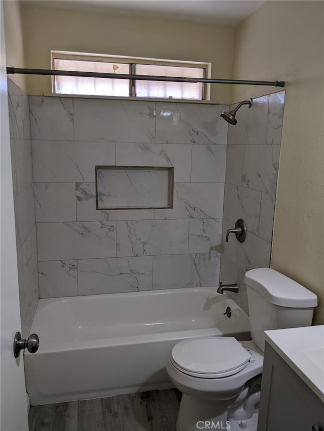18605 New Hampshire St, Adelanto, CA 92301 - bathroom featuring vanity, plenty of natural light, bathing tub / shower combination, and wood finished floors
