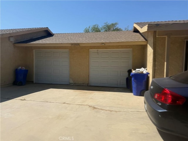 18605 New Hampshire St, Adelanto, CA 92301 - garage featuring concrete driveway