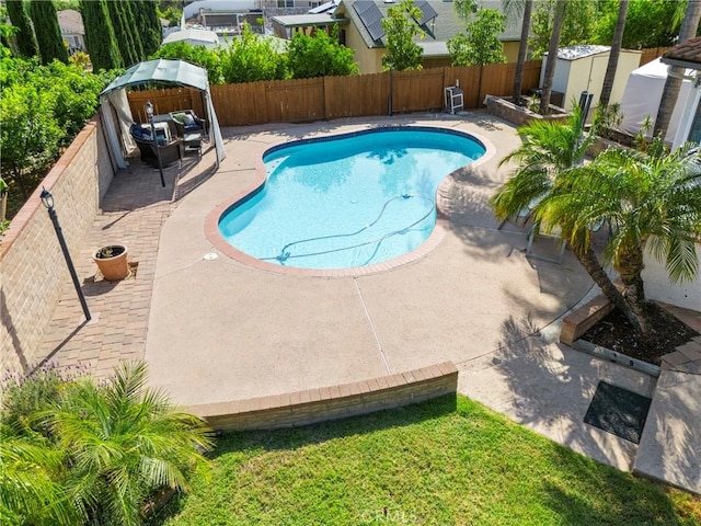 8609 Dunwoodie Rd, Santee, CA 92071 - view of swimming pool featuring a fenced backyard, a patio, and a storage shed