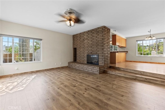 8609 Dunwoodie Rd, Santee, CA 92071 - unfurnished living room featuring ceiling fan, wood finished floors, and plenty of natural light